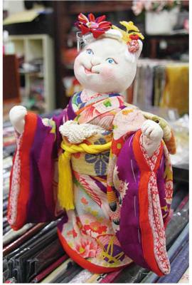 A doll shaped modeled after a beloved cat